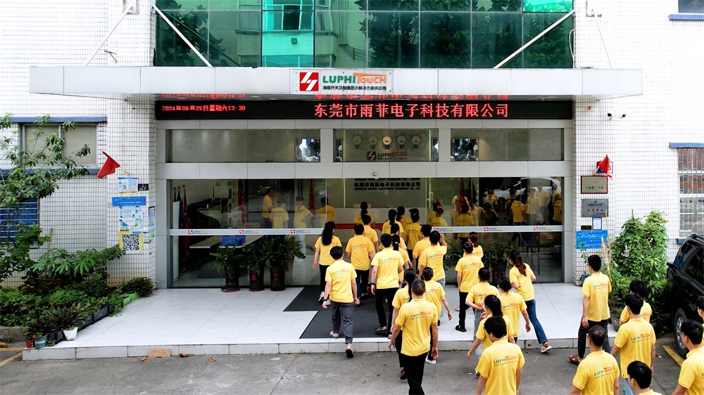 Photo of LuphiTouch® employees entering the company
